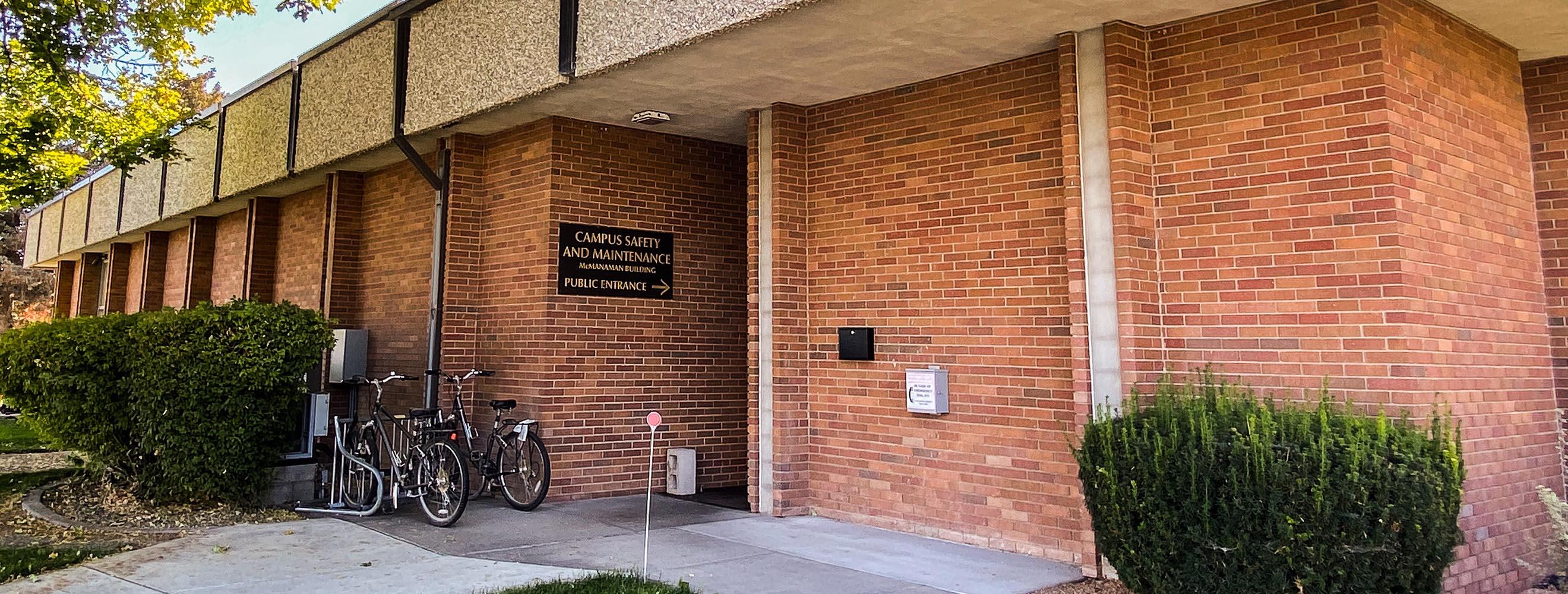 Campus Safety Building with large sign next to entry way